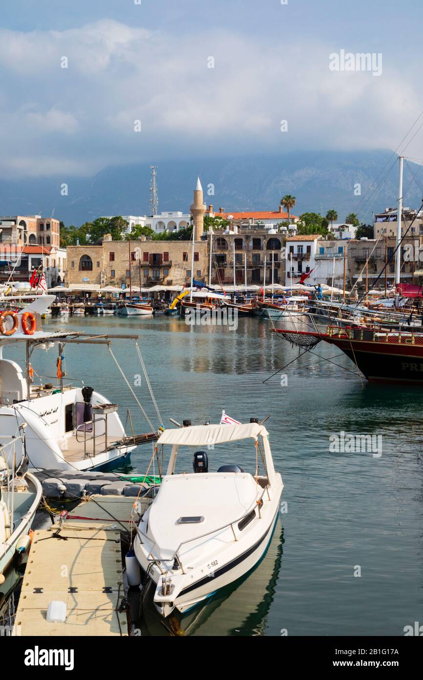 Boats in the port of Kyrenia and castle. Turkish Republic of Northern Cyprus. Stock Photo