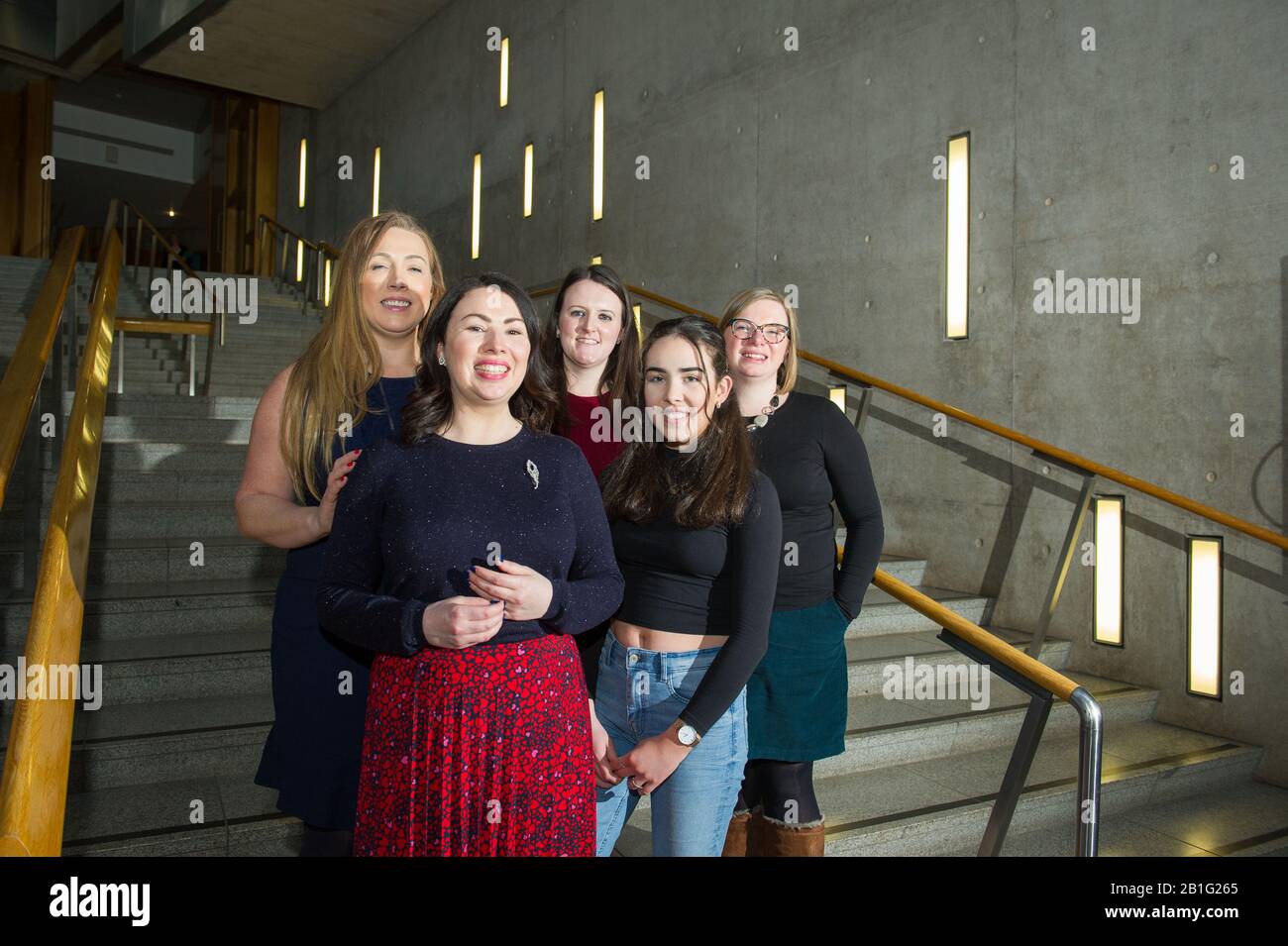 Edinburgh, UK. 25th Feb, 2020. Pictured: (front left) Monica Lennon MSP - Shadow Cabinet Secretary for Health And Sport, Member for Central Scotland for the Scottish Labour Party; pictured with her team who have helped create thee bill and her daughter (front right).  Credit: Colin Fisher/Alamy Live News Stock Photo