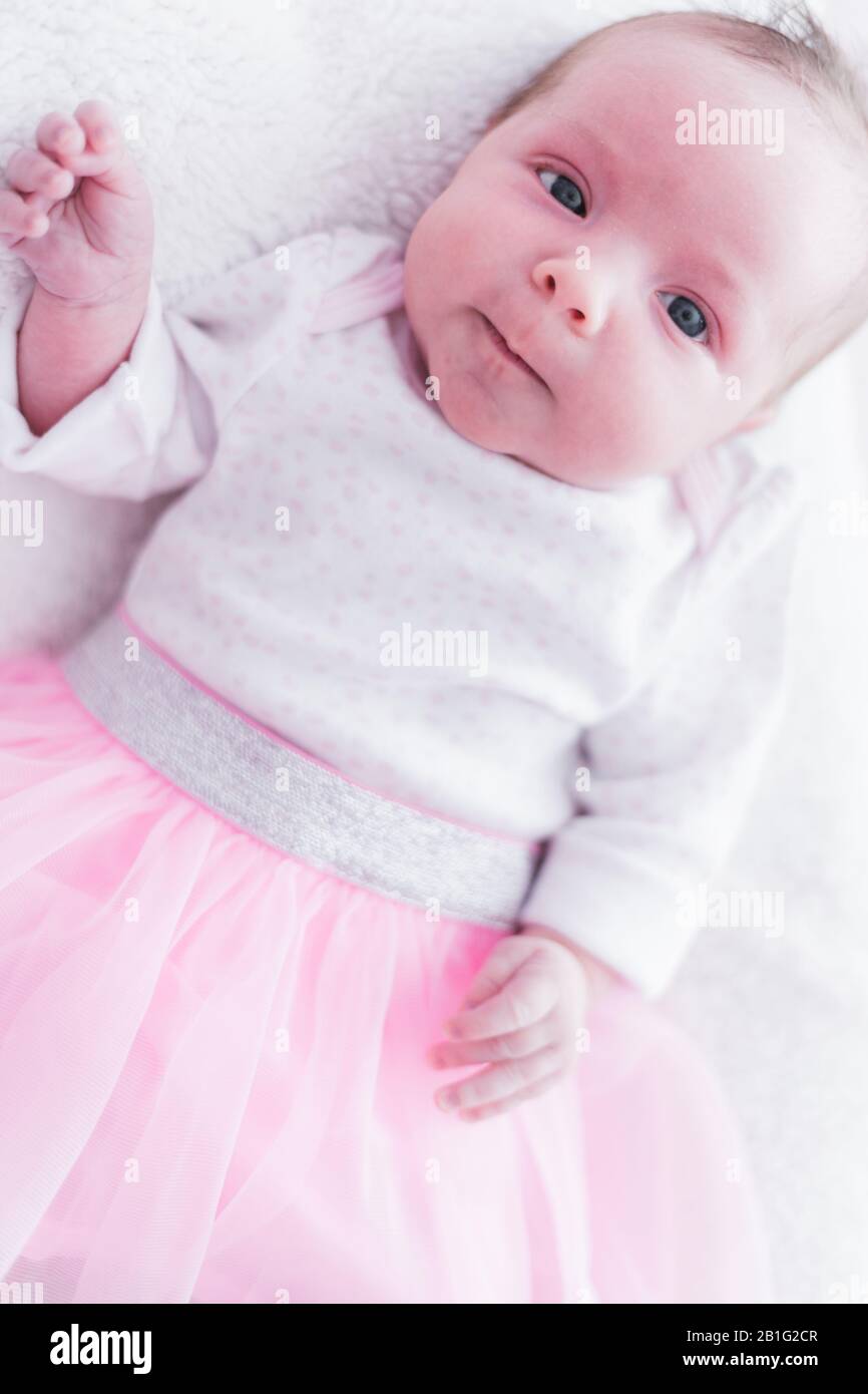 Lifestyle Portrait Of A Newborn Three Weeks Old Baby Girl Stock Photo Alamy