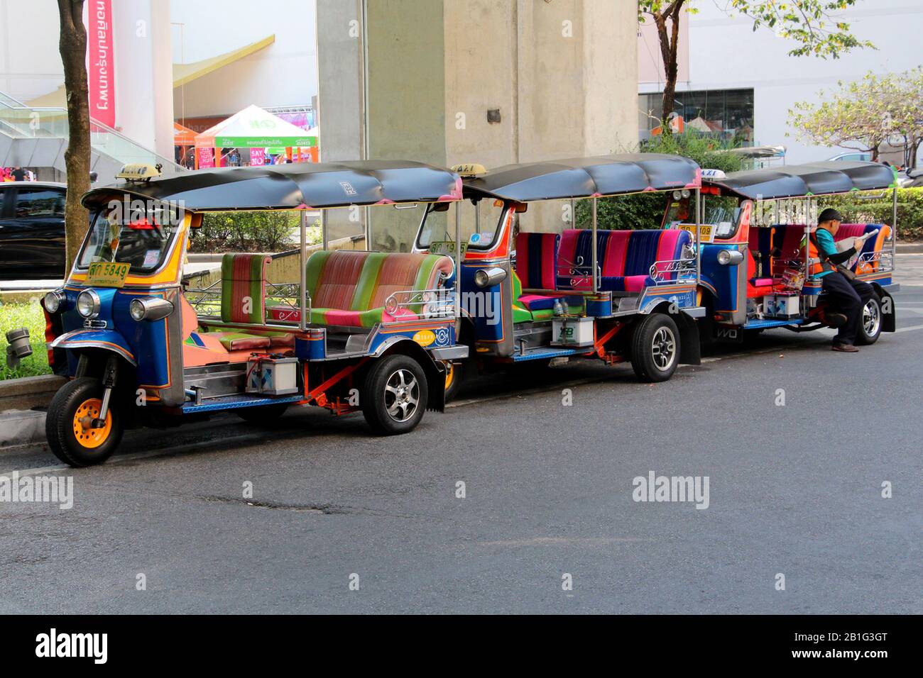 Brightly coloured tuk tuks in Bangkok, Thailand Stock Photo