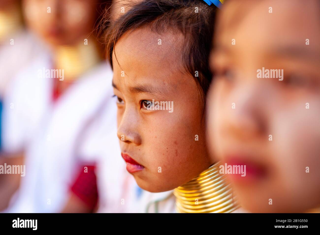 A Group Of Children From The Kayan (Long Neck) Minority Group In Traditional Costume, Pan Pet Village, Loikaw, Kayah State, Myanmar. Stock Photo