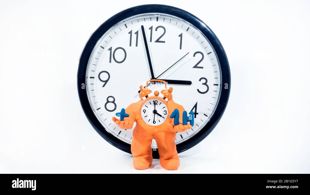 Funny ClockMan made from Play Clay. Isolated on white background