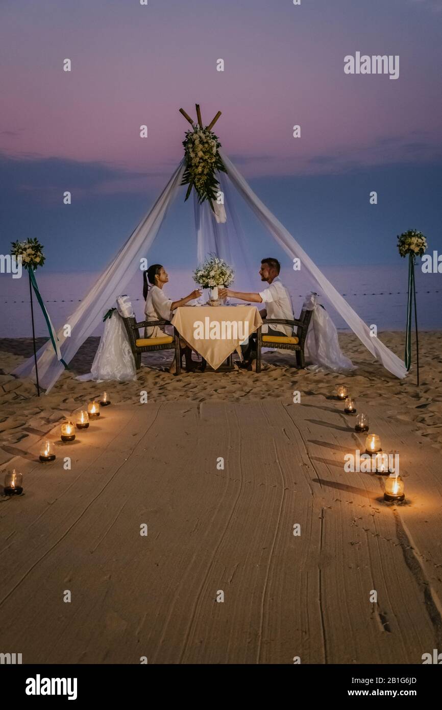 Romantic candlelight dinner on beach hi-res stock photography and ...