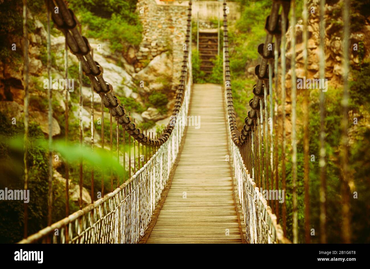 Rope bridge over rocks hires stock photography and images Alamy