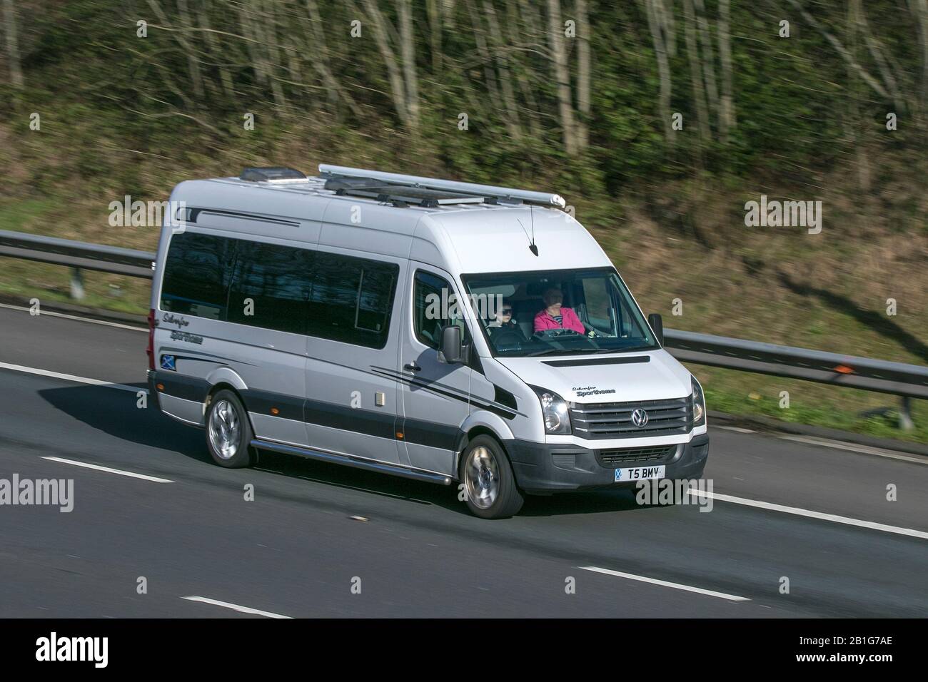 2014 white VW Volkswagen Crafter Cr35 Startline TD; driving on the M6 motorway near Preston in Lancashire, UK Stock Photo