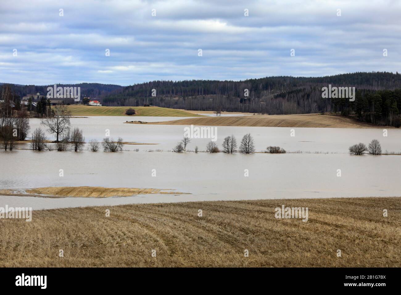 Flooded fields from Nummenjoki river flooding in Saukkola, Lohja, Finland after storms and heavy rainfall in winter 2020. February 23, 2020. Stock Photo