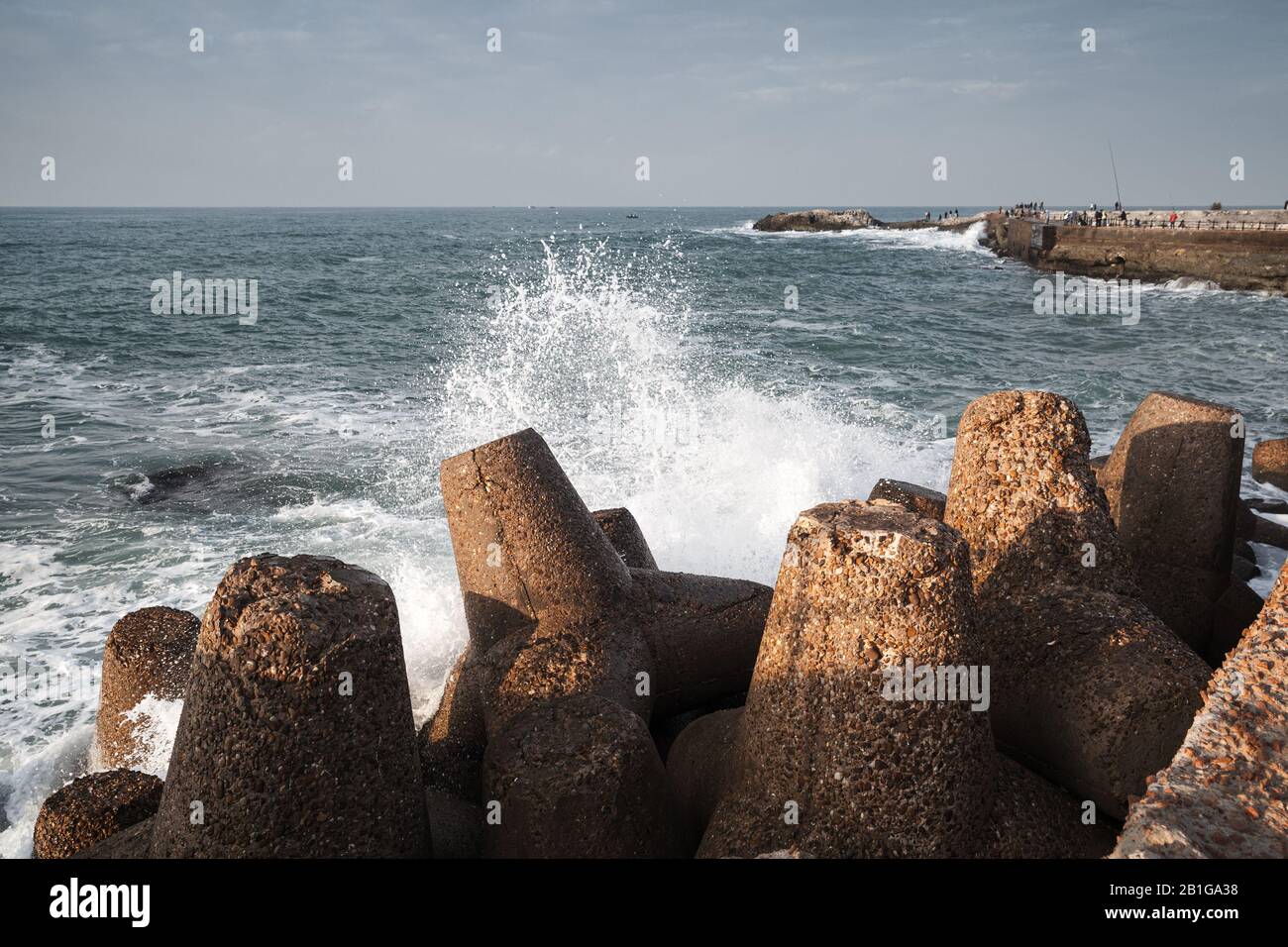 Concrete breakwater and waves at Mediterranean Sea. Montazah beach, Alexandria, Egypt Stock Photo