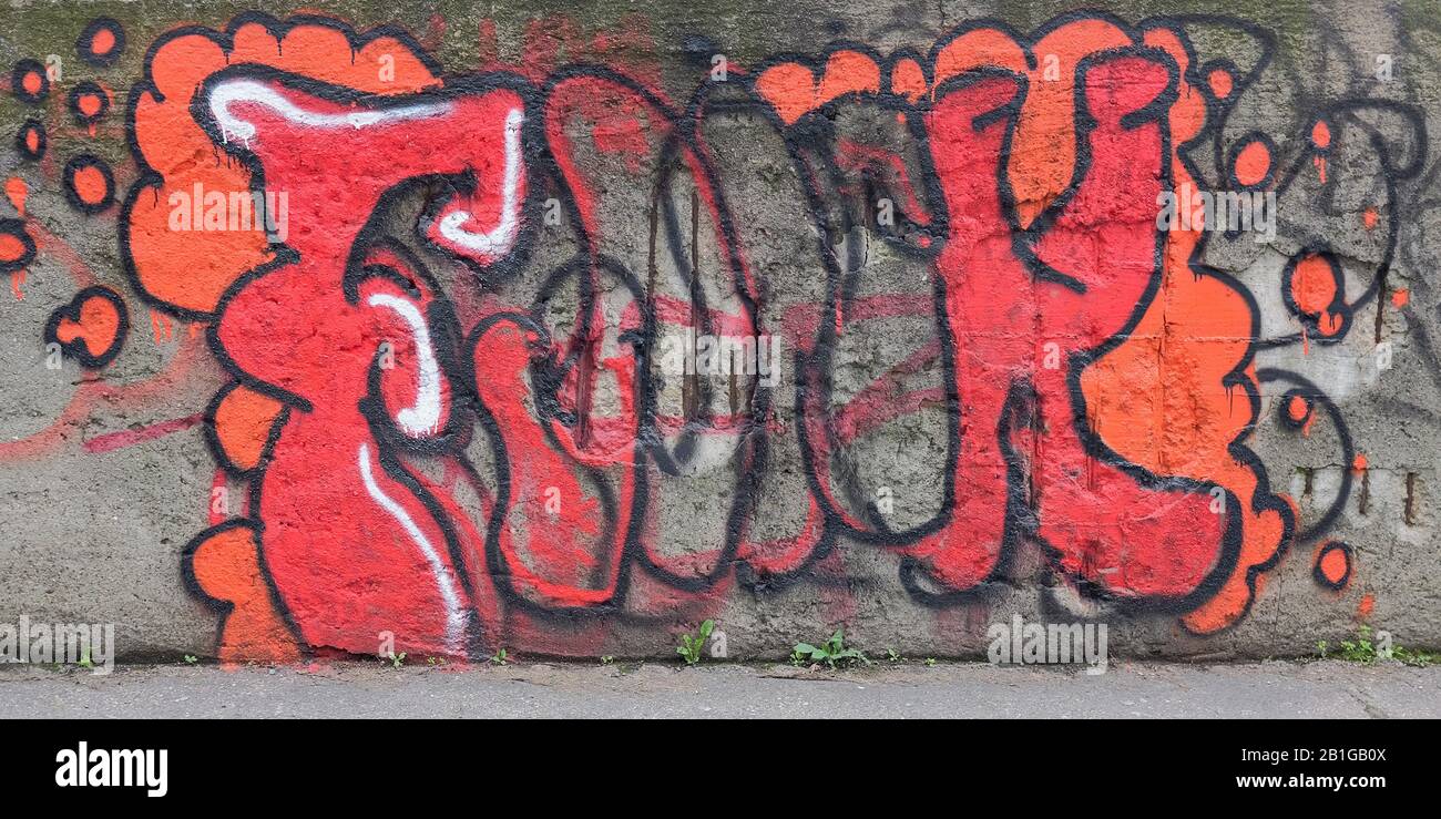 Modern graffiti in Porta Garibaldi distrect of Milan, Italy, depicting a tag Stock Photo