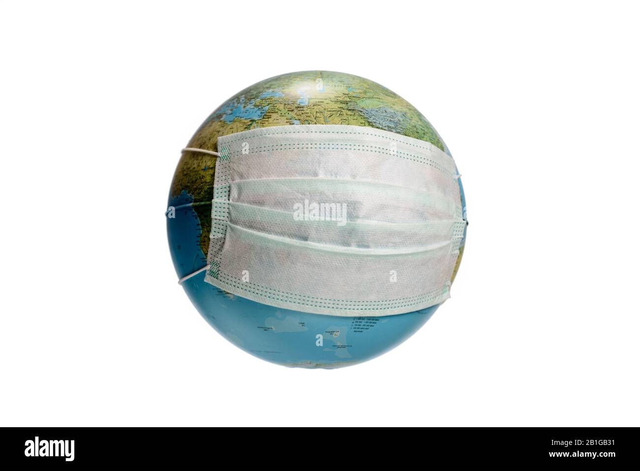 Save The World From The Corona virus. Earth globe with a protective mask, isolated on a white background. Earth globe with Hungarian text. Stock Photo