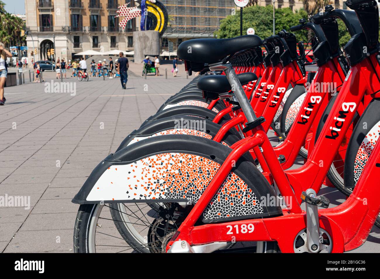 BARSELONA, SPAIN - AUGUST 6, 2019: Bicycles for rent on the street of the city. Stock Photo