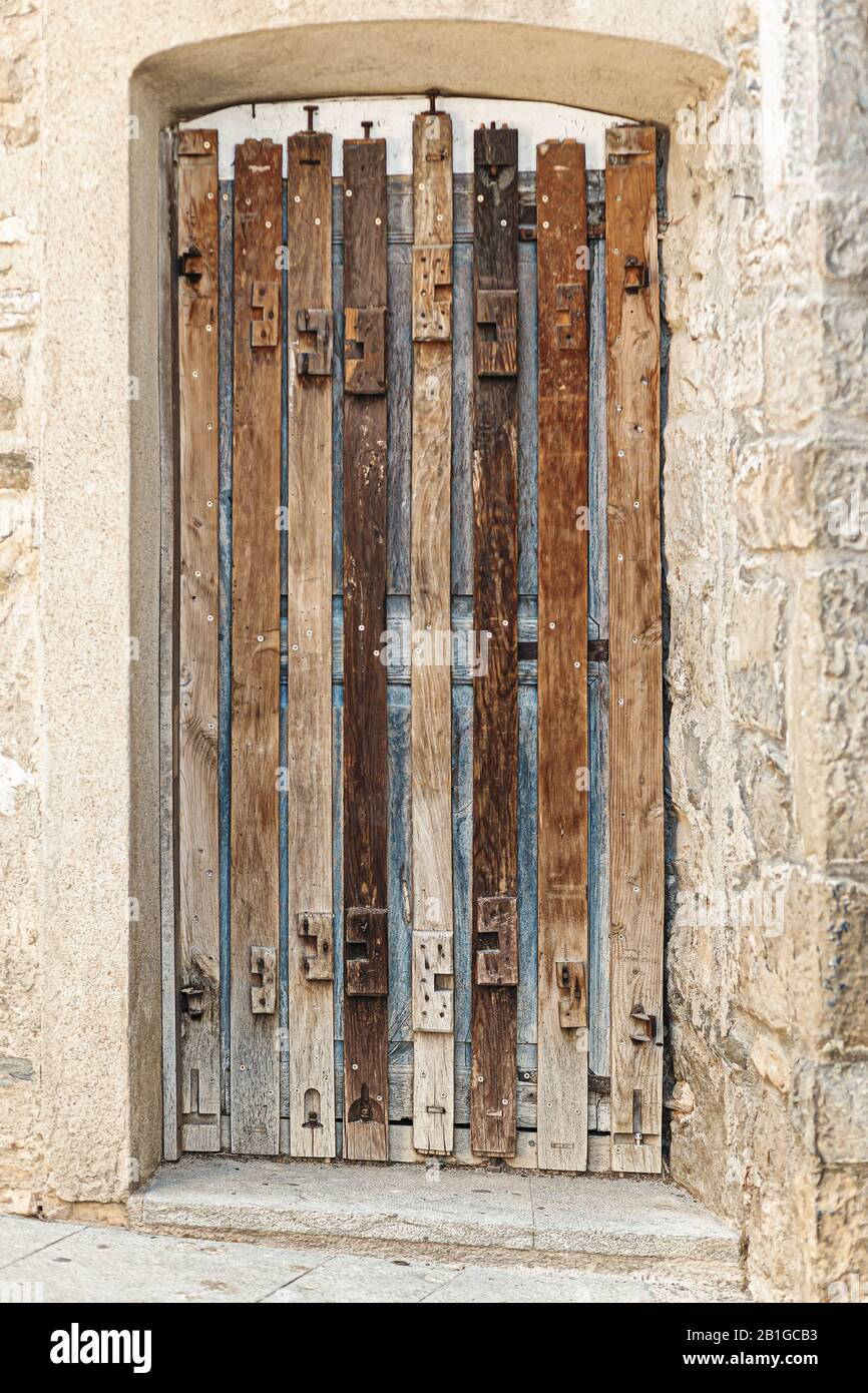 An old wooden door in a stone house Stock Photo - Alamy