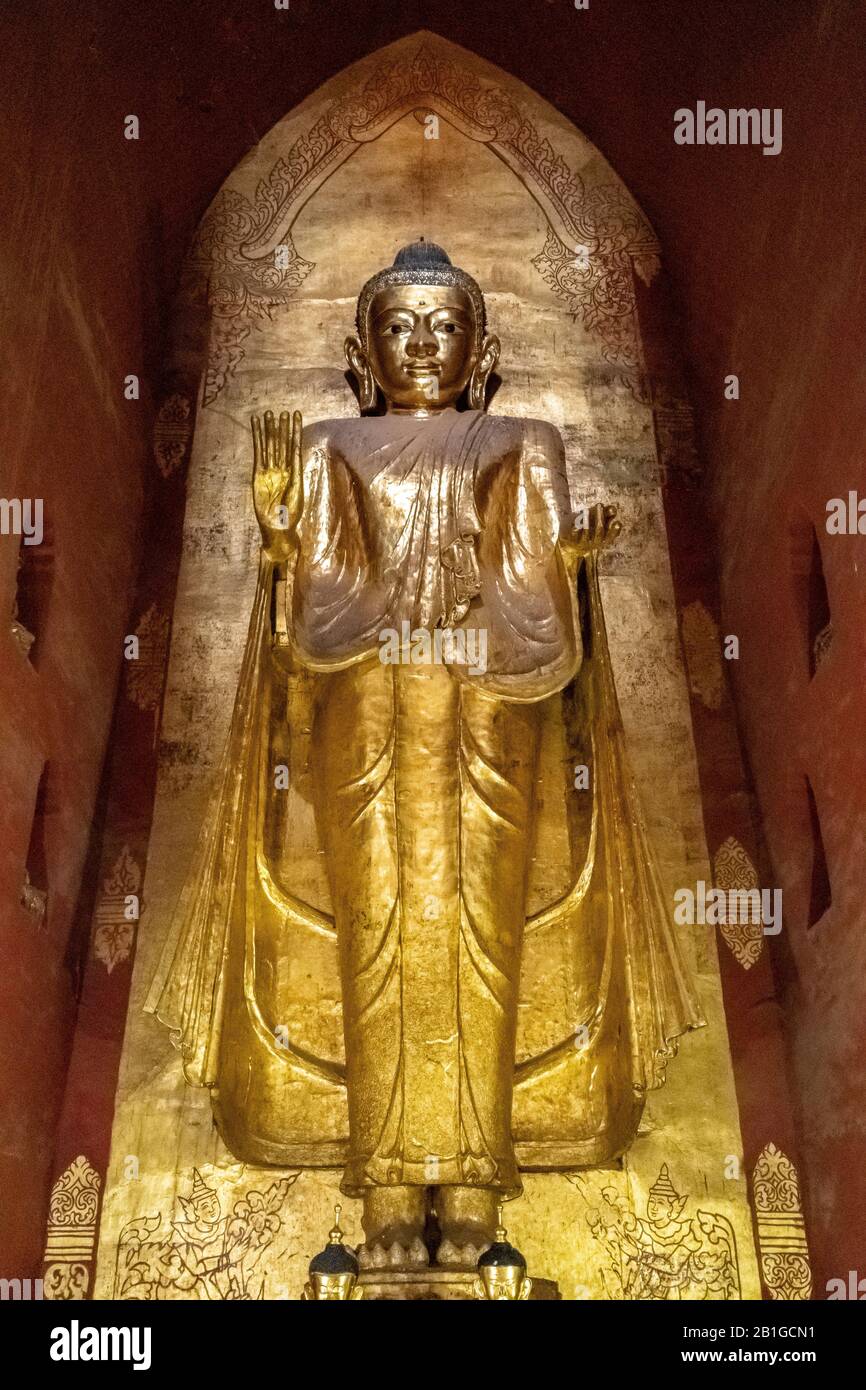 Standing Buddha statue at Ananda Pagoda, Bagan, Mandalay Region, Myanmar Stock Photo