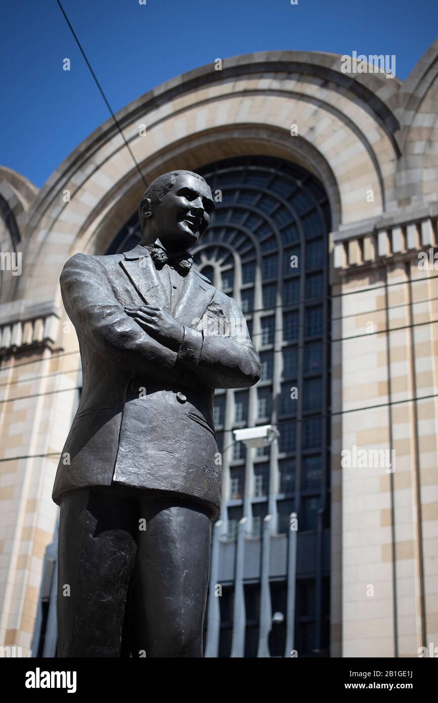 Buenos Aires, Argentina - February 22, 2020: Carlos Gardel memorial statue view with the Abasto Shopping in the back in Buenos Aires, Argentina Stock Photo