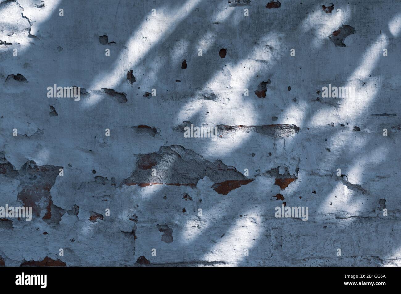 Texture from old rough grunge weathered wall with cracks and light ...