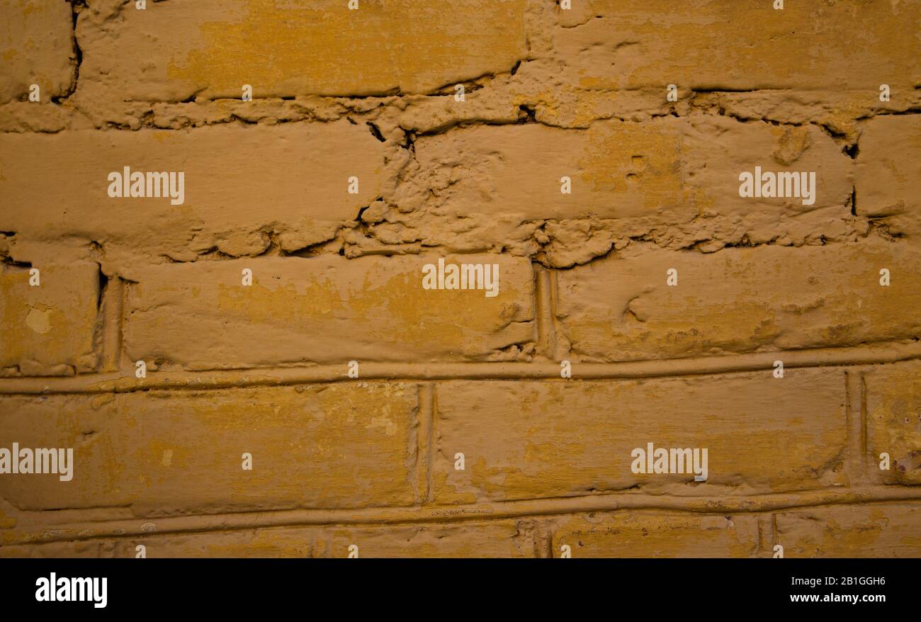 old brown brick wall texture background close up. free space for text ...