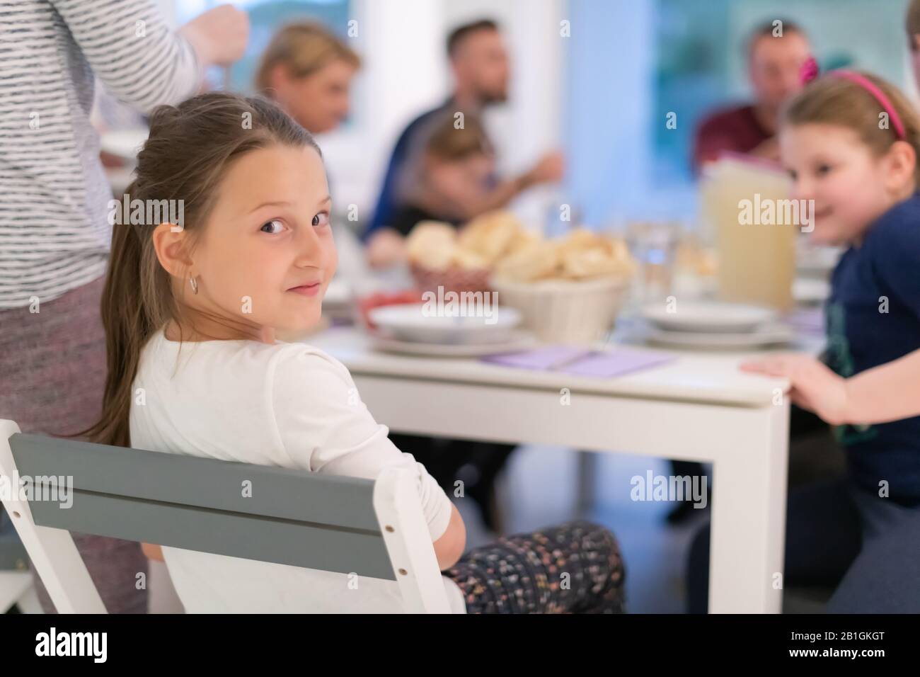 Eid Mubarak Muslim family having Iftar dinner eating dates to break