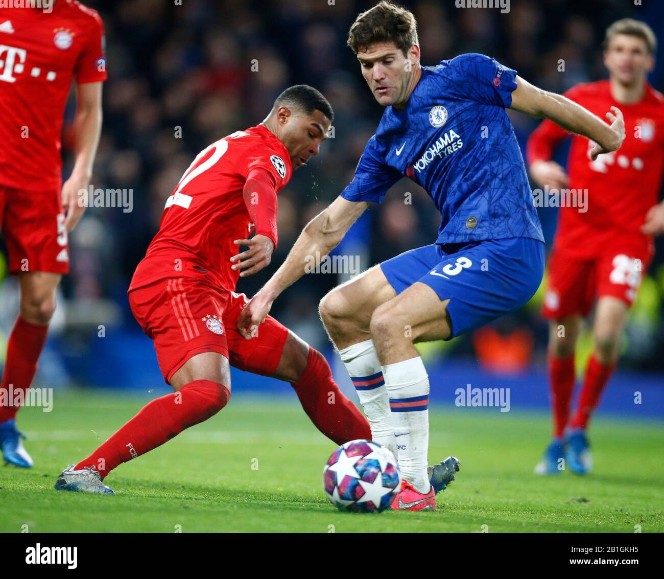 LONDON, UNITED KINGDOM. FEBRUARY 25 L-R Serge Gnabry of FC Bayern Munich and Chelsea's Marcos Alonso during Champion League Round 16 1st Leg between Chelsea and Bayer Munchen at Stanford Bridge Stadium, London, England on 25 February 2020 Credit: Action Foto Sport/Alamy Live News Stock Photo
