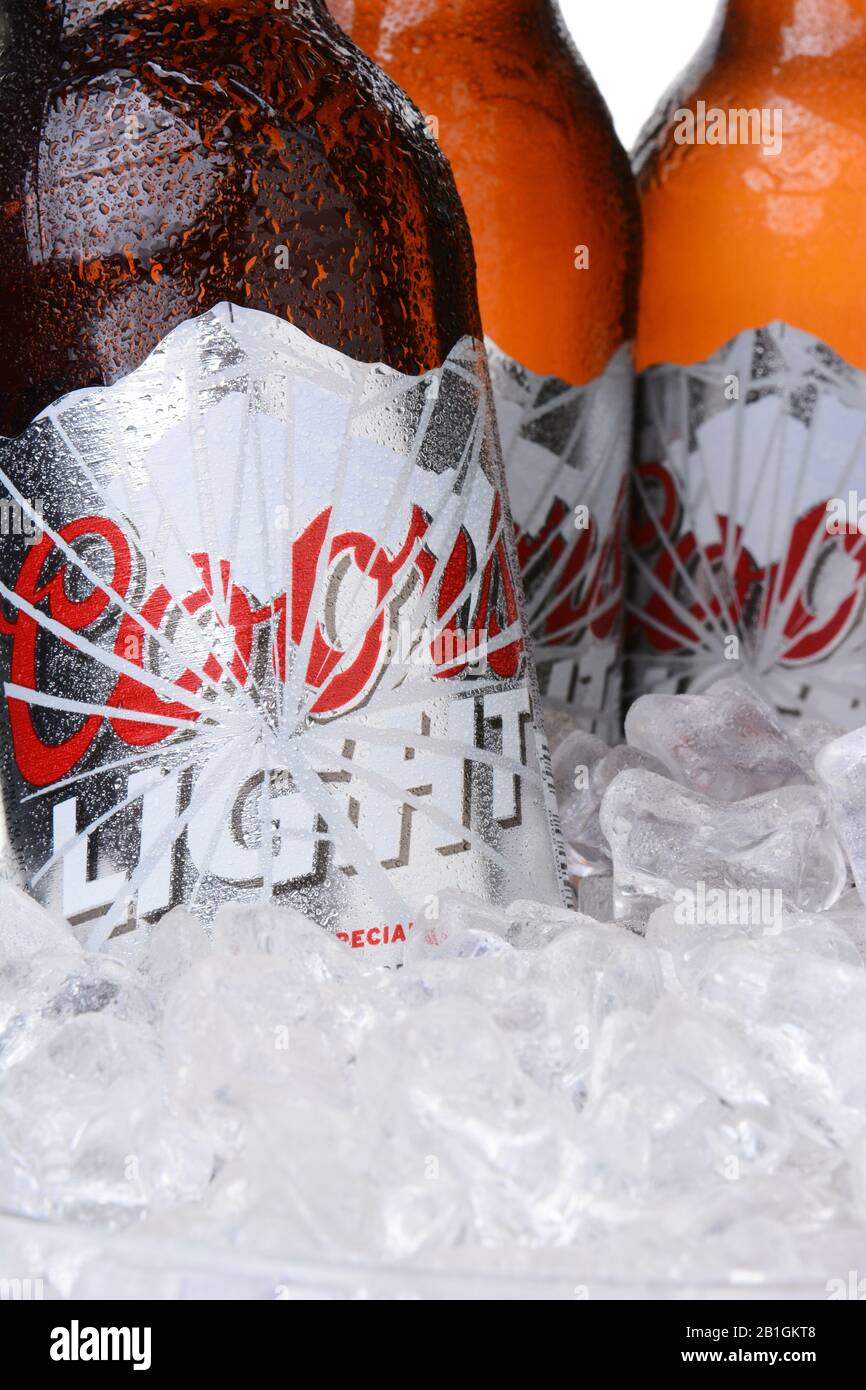 IRVINE, CA - MAY 30, 2014: Closeup of Coors Light bottles in ice. Coors operates a brewery in Golden, Colorado, that is the largest single brewery fac Stock Photo