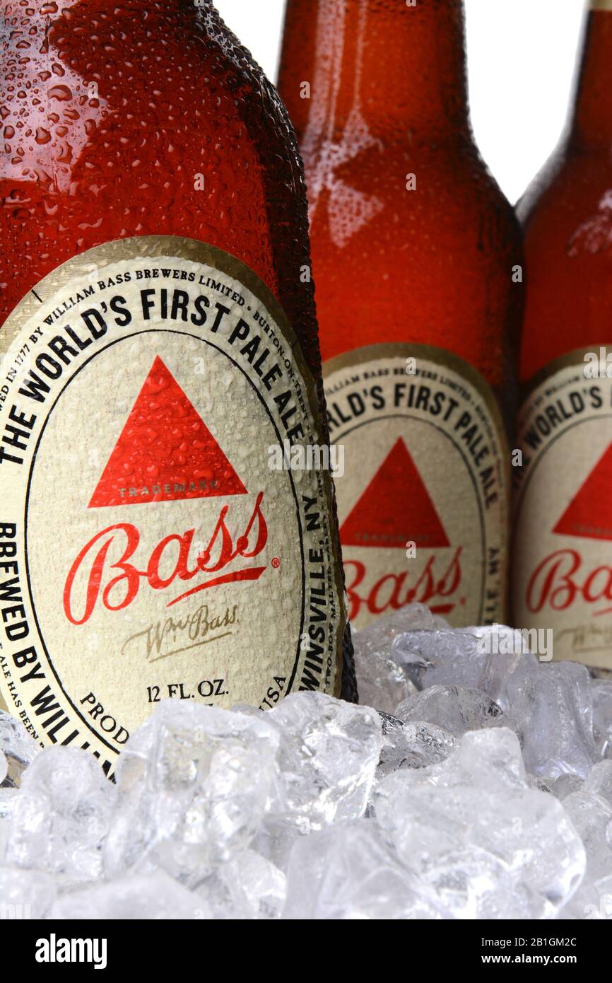 IRVINE, CA - MAY 30, 2014: Closeup 0f Bass Pale Ale bottles in ice. The Bass Brewery was founded in 1777 by William Bass, in Trent, England is now own Stock Photo