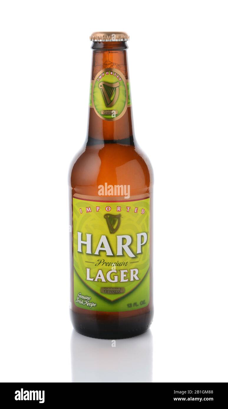 IRVINE, CA - JANUARY, 11, 2015: A single bottle of Harp Lager. Harp is an Irish lager created in 1960 by the Guinness Brewing Company, brewed with pur Stock Photo