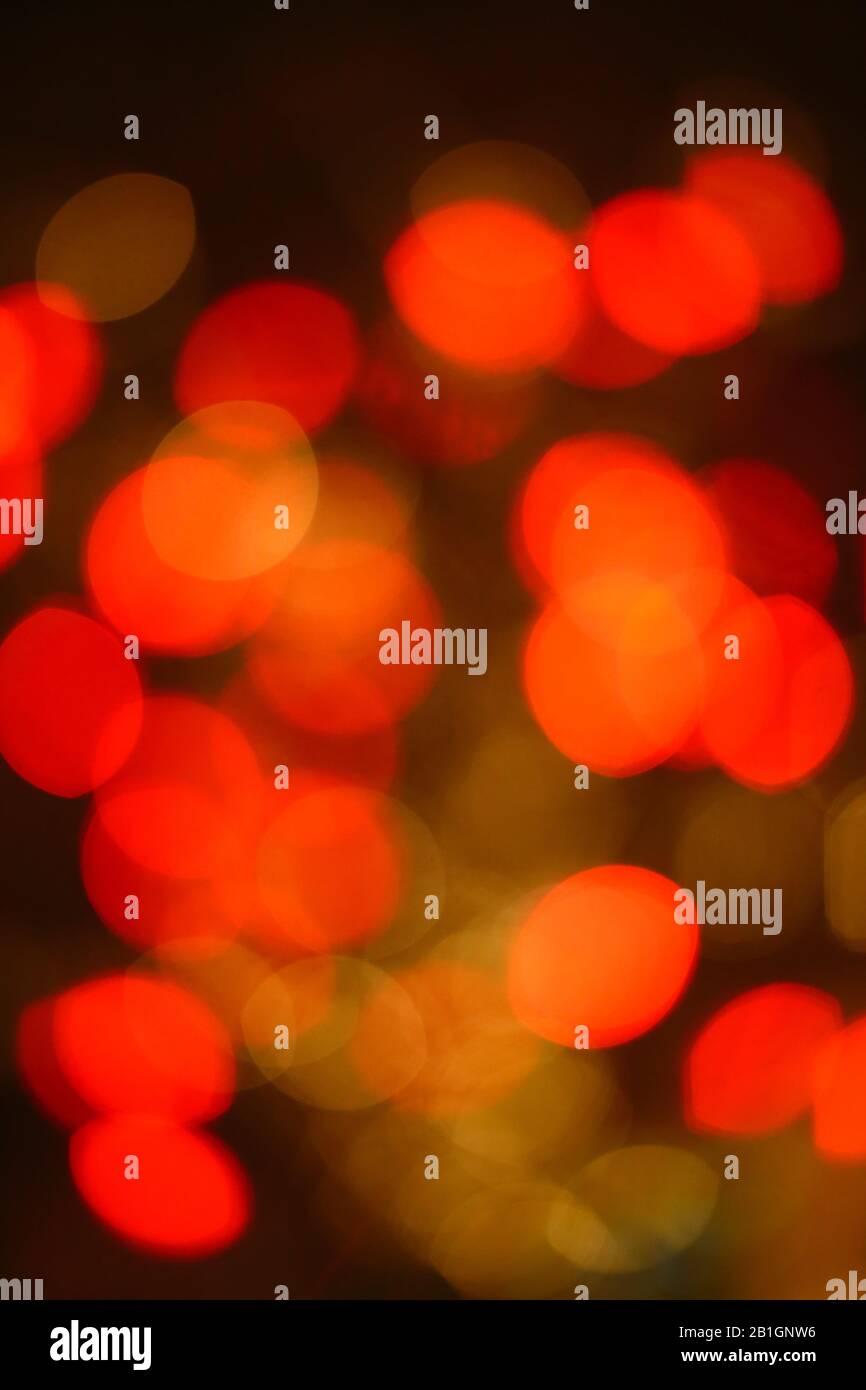 Blurred red and yellow lights with slightly oval shape. Stock Photo