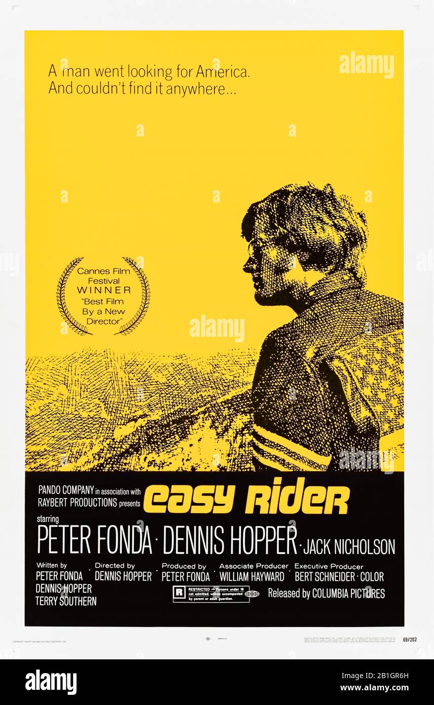 Easy Ride (1969) directed by Dennis Hopper and starring Peter Fonda, Dennis Hopper, Jack Nicholson and Luana Anders. Hippies Wyatt and Billy are on a road trip with ill gotten gains and find a culture class in America. Stock Photo