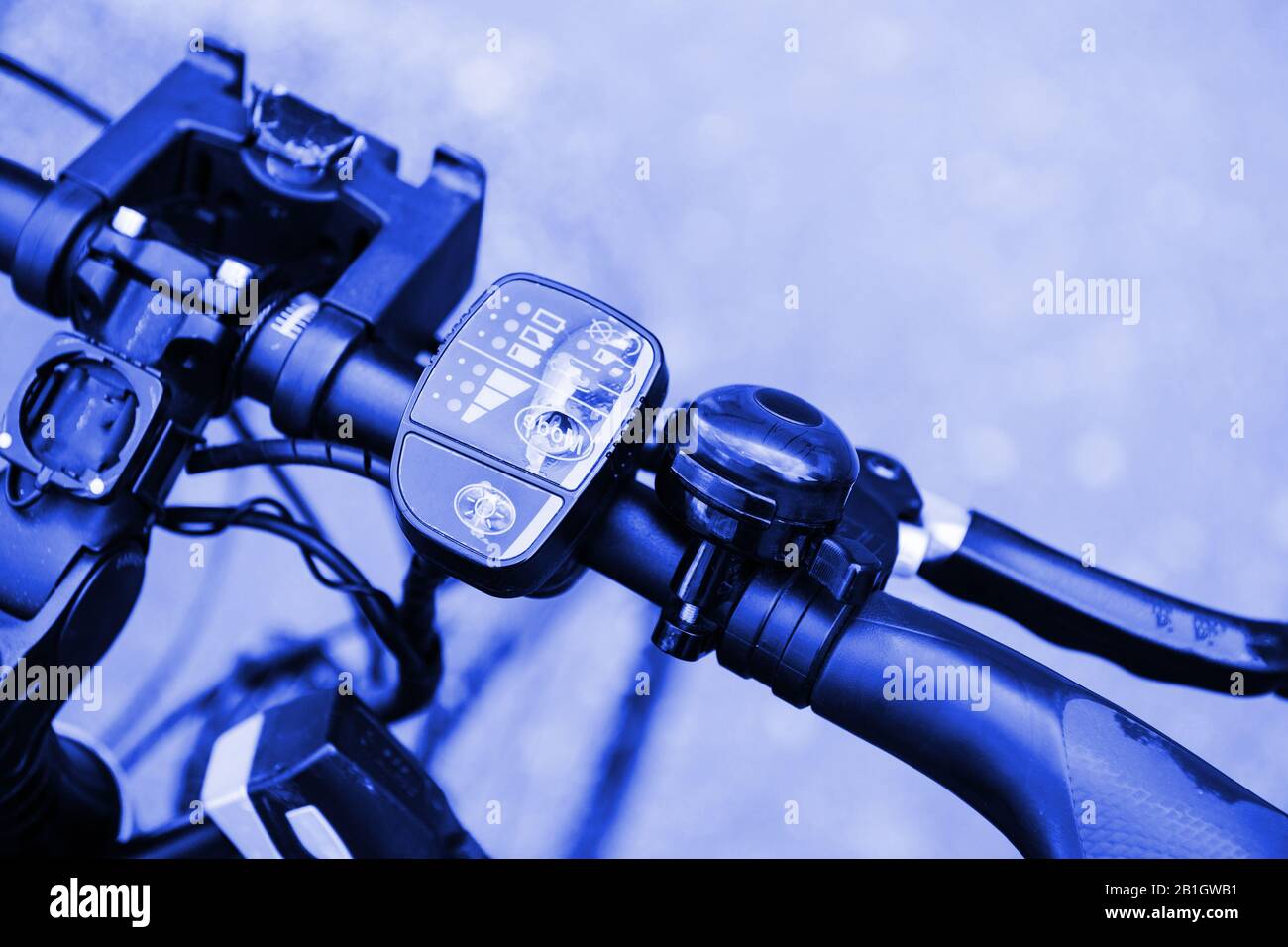 Closeup macro shot of the steering wheel of a modern electric bicycle