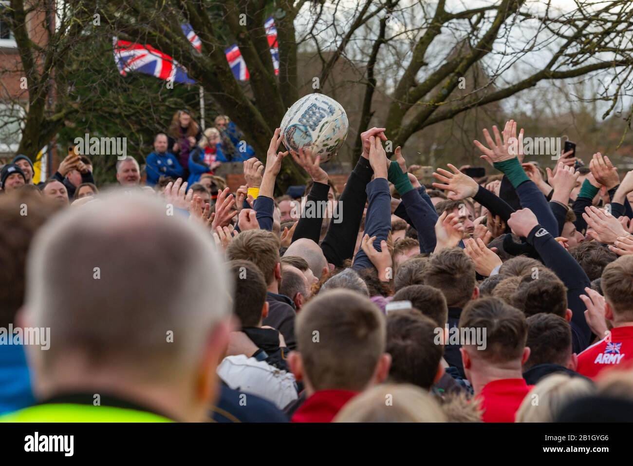 Ashbourne, UK. 25th Feb, 2020. The first day of the two day Shrovetide Football Game in the market town of Ashbourne, Derbyshire. The game is played with two teams, the Up'Ards and the Down'Ards. There are two goal posts 3 miles (4.8 km) apart, one at Sturston Mill (where the Up'Ards attempt to score), other at Clifton Mill (where the Down'Ards score). Penelope Barritt/Alamy Live News Stock Photo