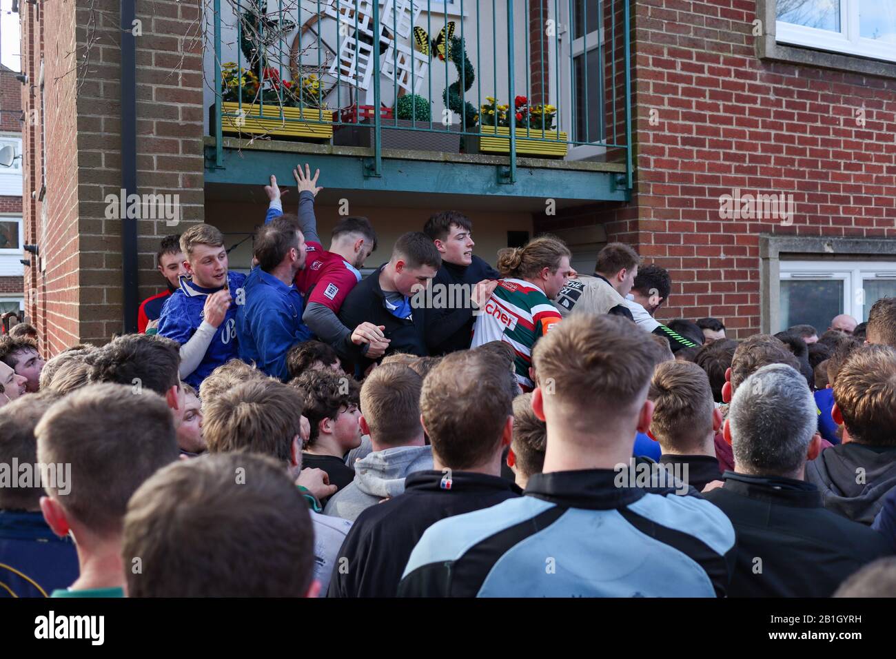 Ashbourne, UK. 25th Feb, 2020. The first day of the two day Shrovetide Football Game in the market town of Ashbourne, Derbyshire. The game is played with two teams, the Up'Ards and the Down'Ards. There are two goal posts 3 miles (4.8 km) apart, one at Sturston Mill (where the Up'Ards attempt to score), other at Clifton Mill (where the Down'Ards score). Penelope Barritt/Alamy Live News Stock Photo