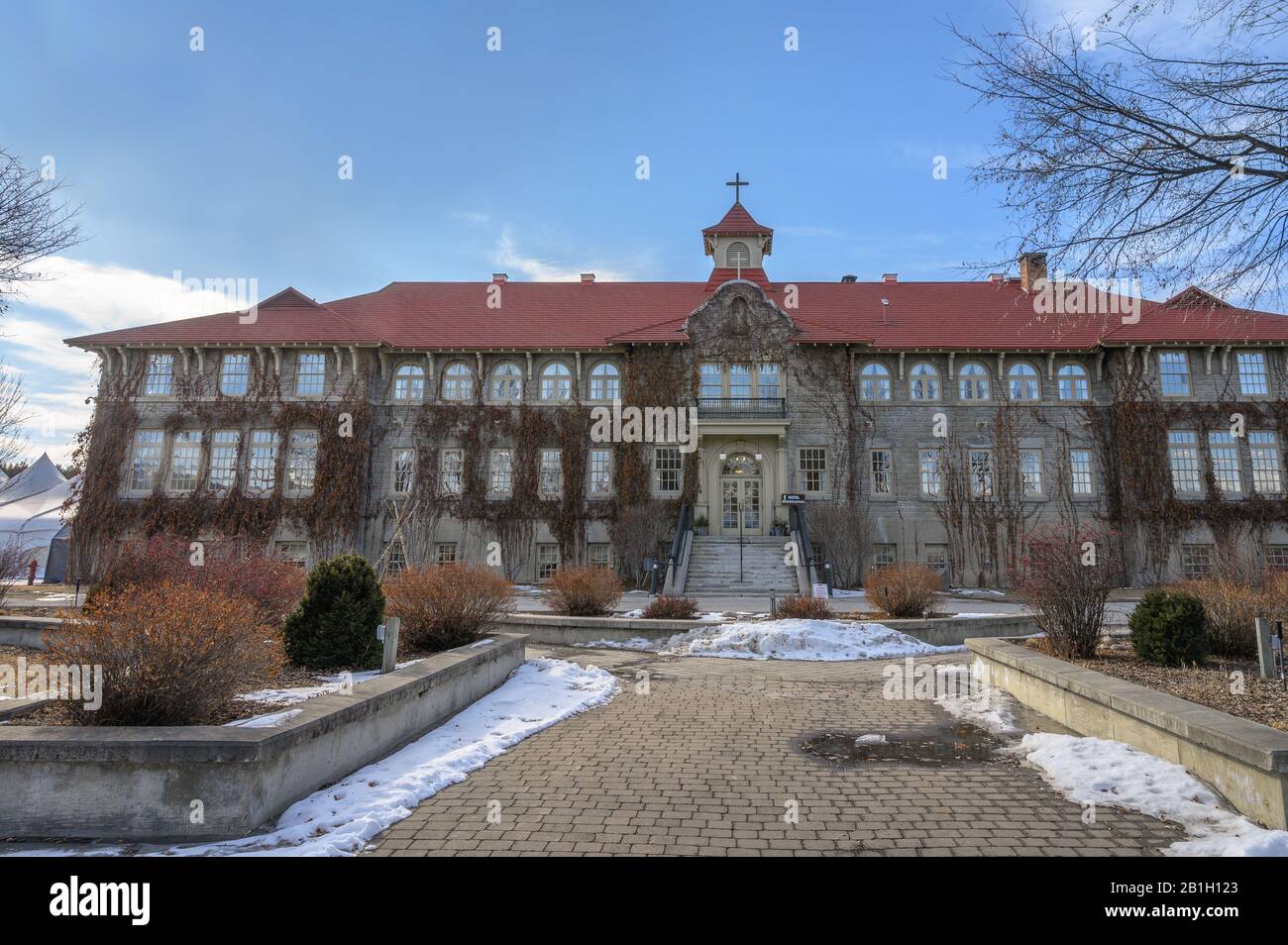 Saint Eugene Mission, British Columbia, Canada – February 21, 2020:  Exterior view of the Saint Eugene Mission school, formally an aboriginal resident Stock Photo