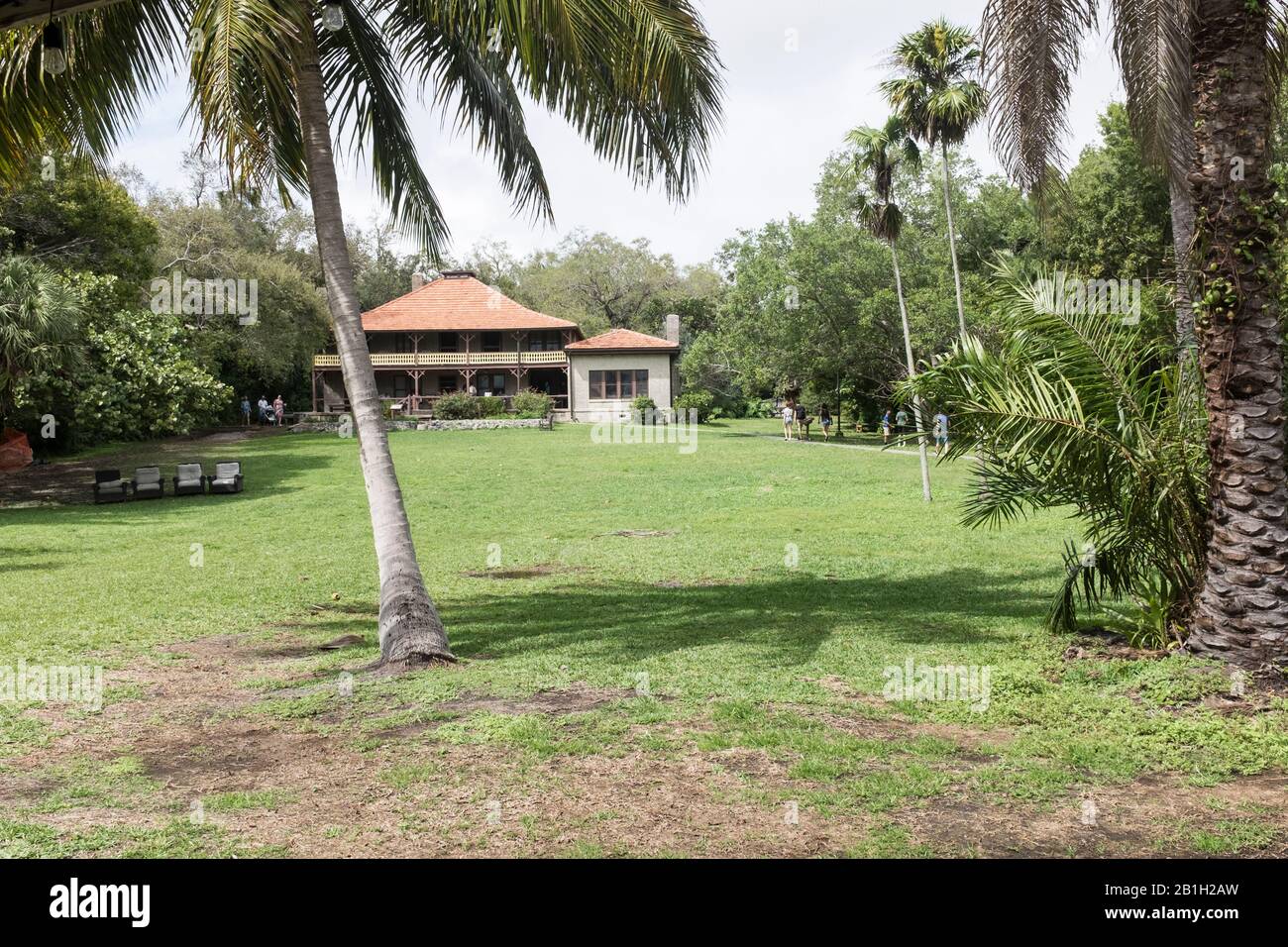 A view up the lawn to the Ralph Middleton Munroe House in the Barnacle State Park in Miami, Florida Stock Photo