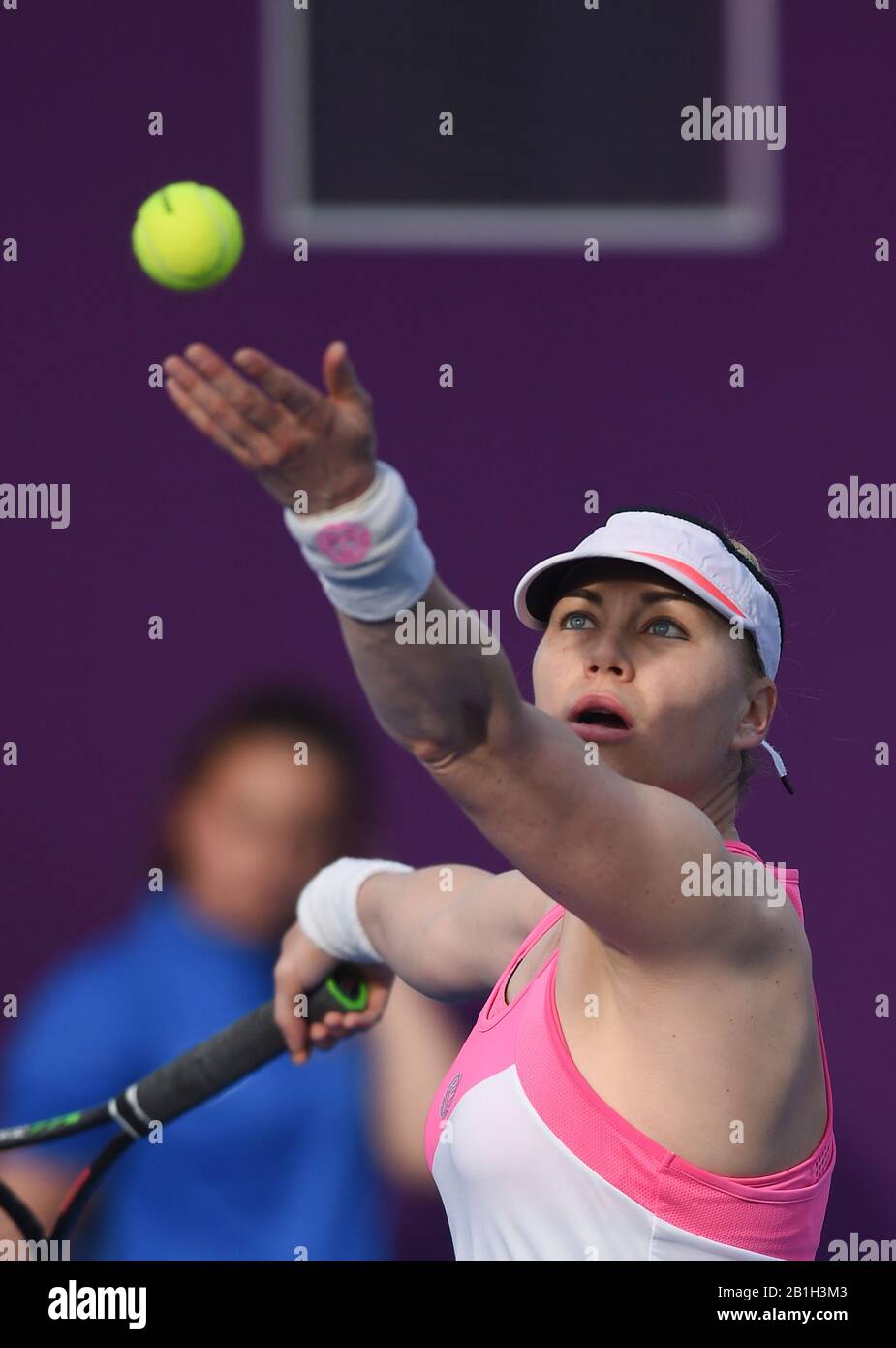 Doha, Qatar. 25th Feb, 2020. Vera Zvonareva of Russia serves during the women's singles second round match against Zheng Saisai of China at the 2020 WTA Qatar Open in Doha, Qatar, Feb. 25, 2020. Credit: Nikku/Xinhua/Alamy Live News Stock Photo