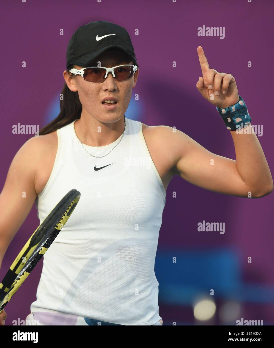 Doha, Qatar. 25th Feb, 2020. Zheng Saisai of China gestures during the women's singles second round match against Vera Zvonareva of Russia at the 2020 WTA Qatar Open in Doha, Qatar, Feb. 25, 2020. Credit: Nikku/Xinhua/Alamy Live News Stock Photo