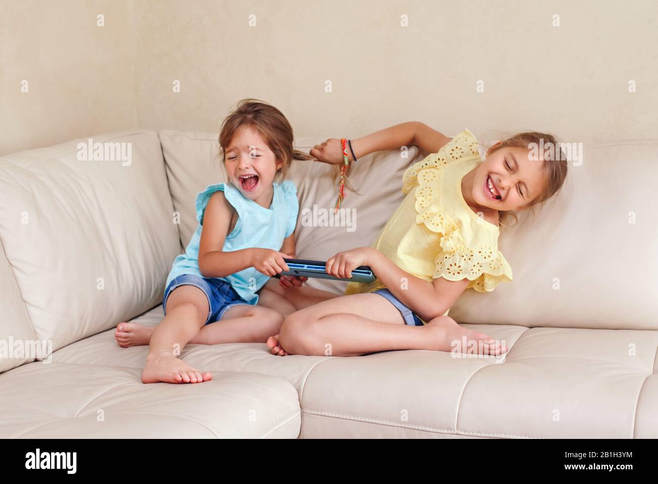 Two Little Mad Angry Girls Sisters Having Fight At Home Friends Girls Can Not Share Gadget