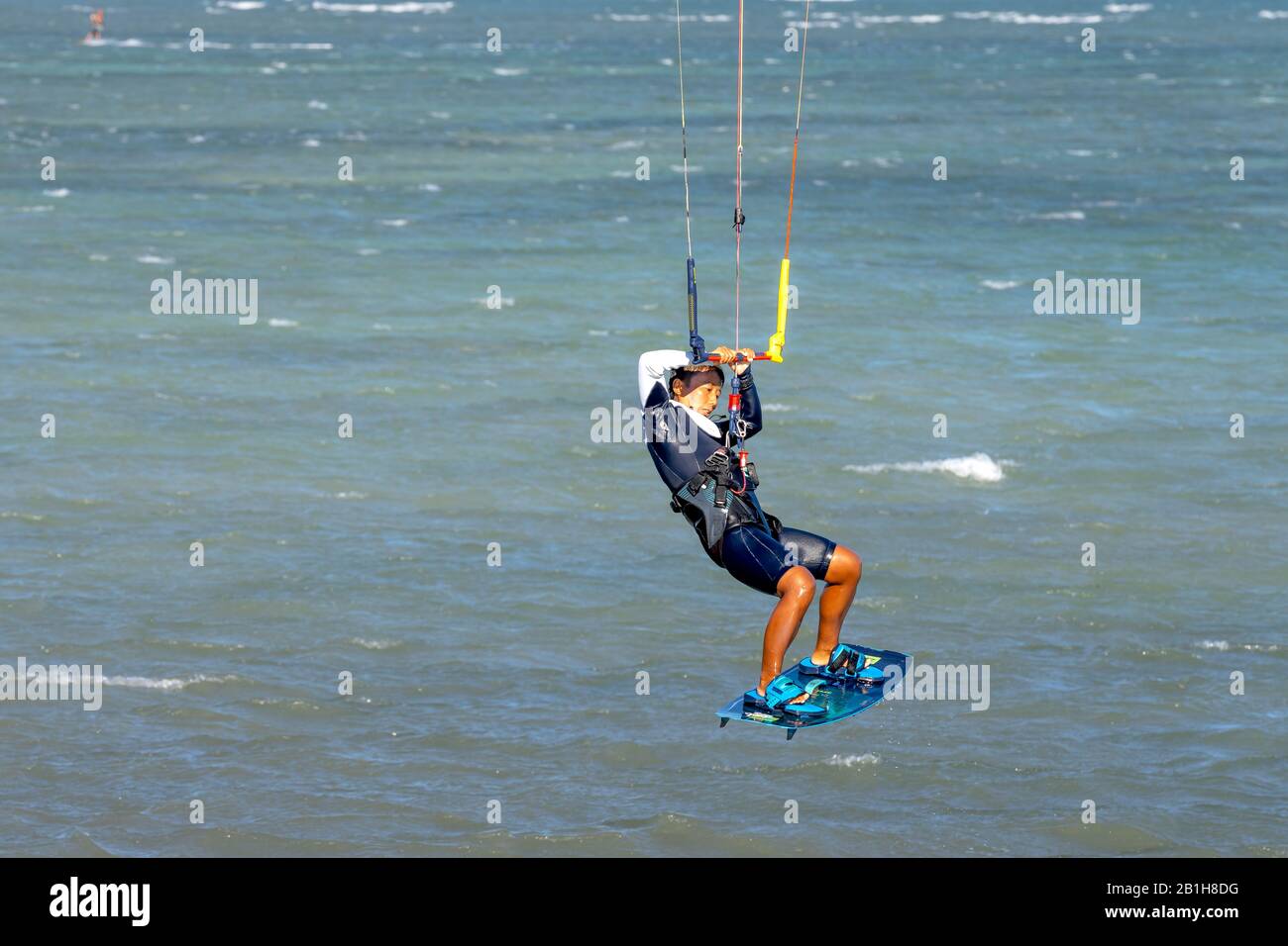 Ninh Chu Beach, Ninh Thuan Province, Vietnam - January 9, 2020: Kite surfing scene on the beach in Ninh Chu. Kite surfing is a sport that is loved by Stock Photo