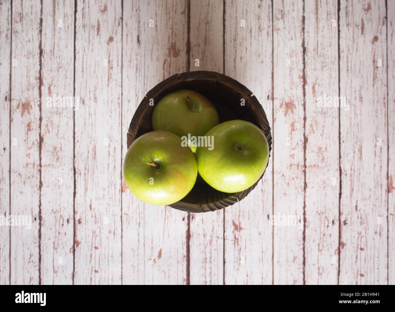 centered apples on bucket Stock Photo