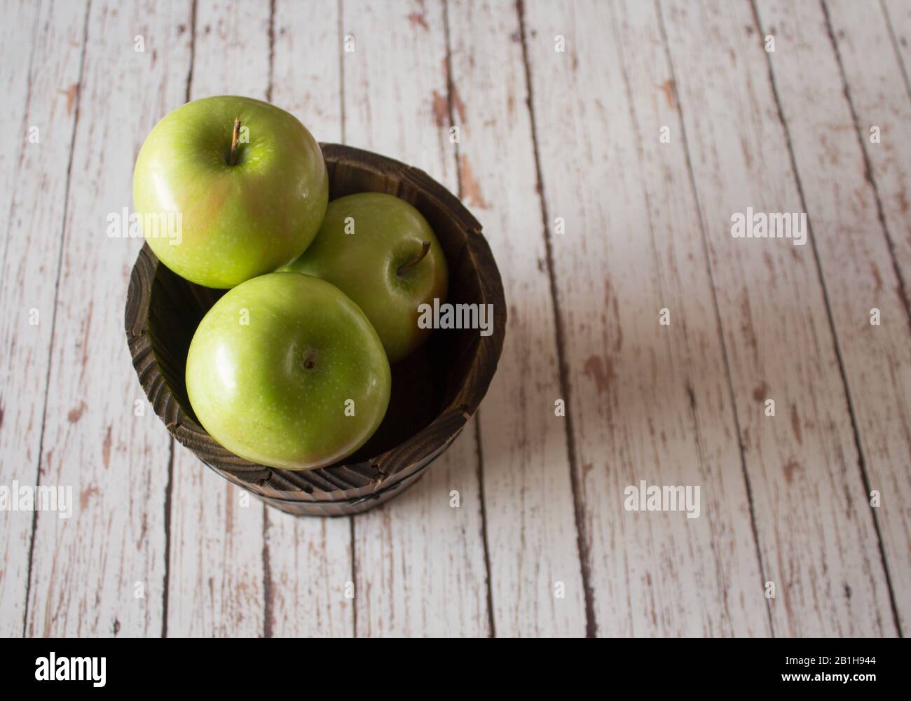 apples on bucket Stock Photo