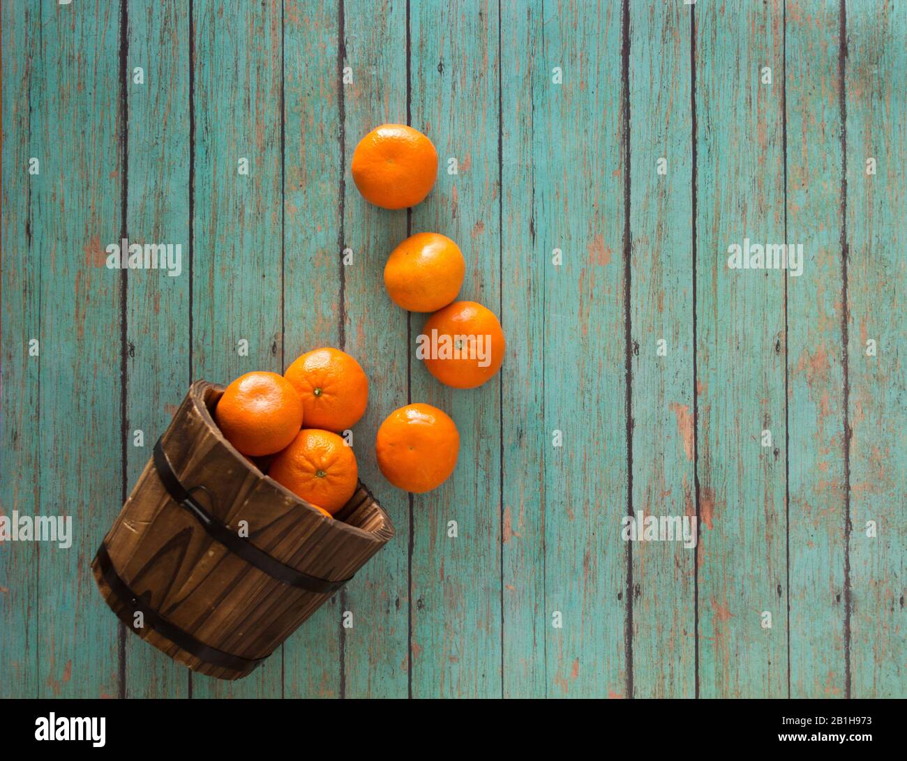 oranges on wood bucket Stock Photo