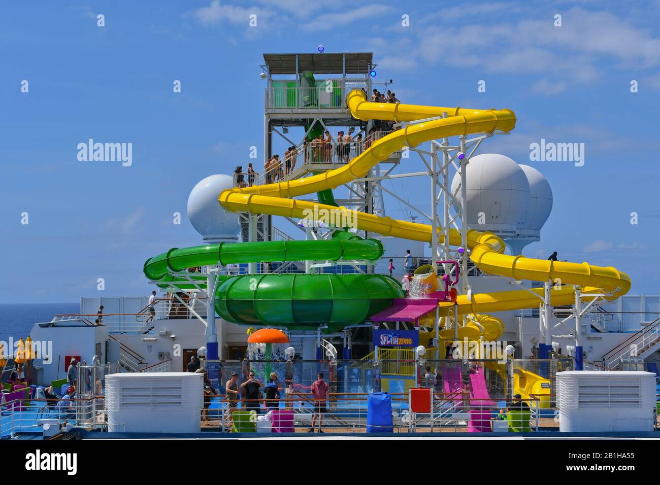 Carnival Splendor, South Pacific Ocean - February 13, 2020: Water slides and splash zone on cruise ship. Stock Photo