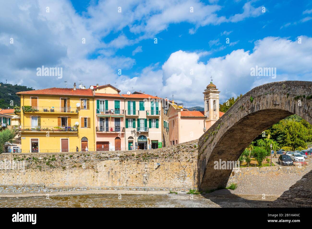 The famous, medieval Monet bridge with the Church of San Filippo next to it in the historic ancient hilltop city of Dolceacqua, Italy. Stock Photo