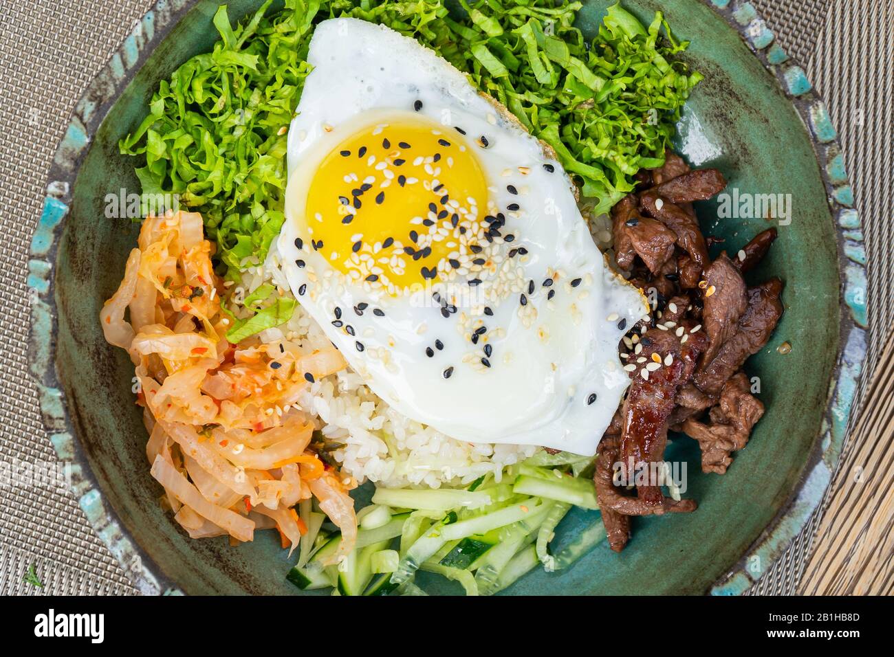 Korean bibimbap rice, a traditional food of Korea top up with meat and