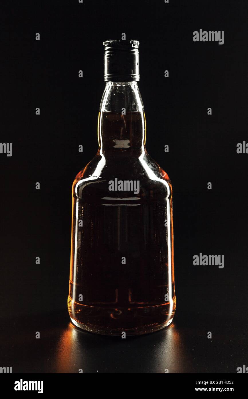 https://c8.alamy.com/comp/2B1HD52/bottle-of-whiskey-or-rum-or-alcohol-stands-2B1HD52.jpg