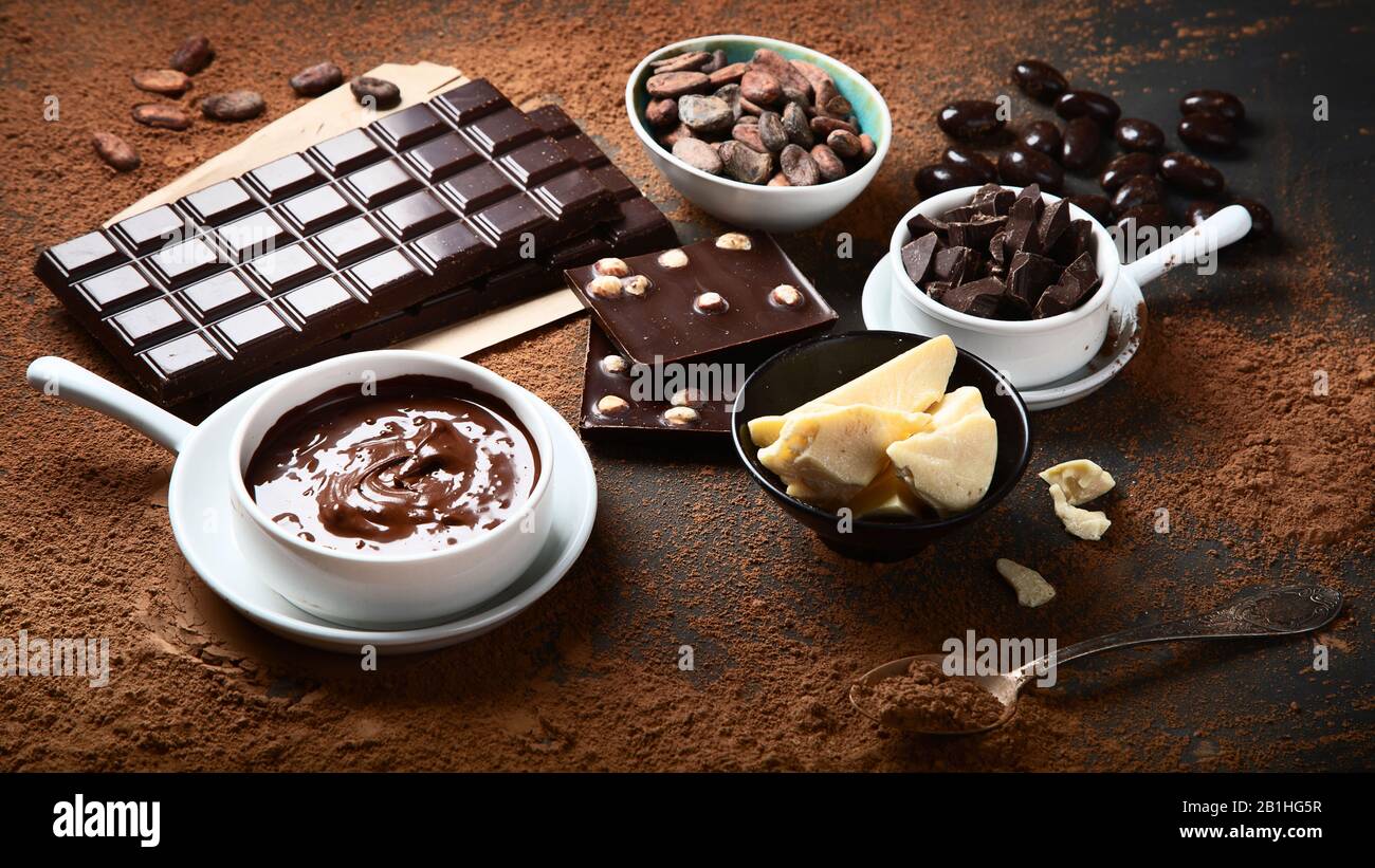 Dark chocolate bar,chocolate pieces and cocoa beans, cocoa powder on ...