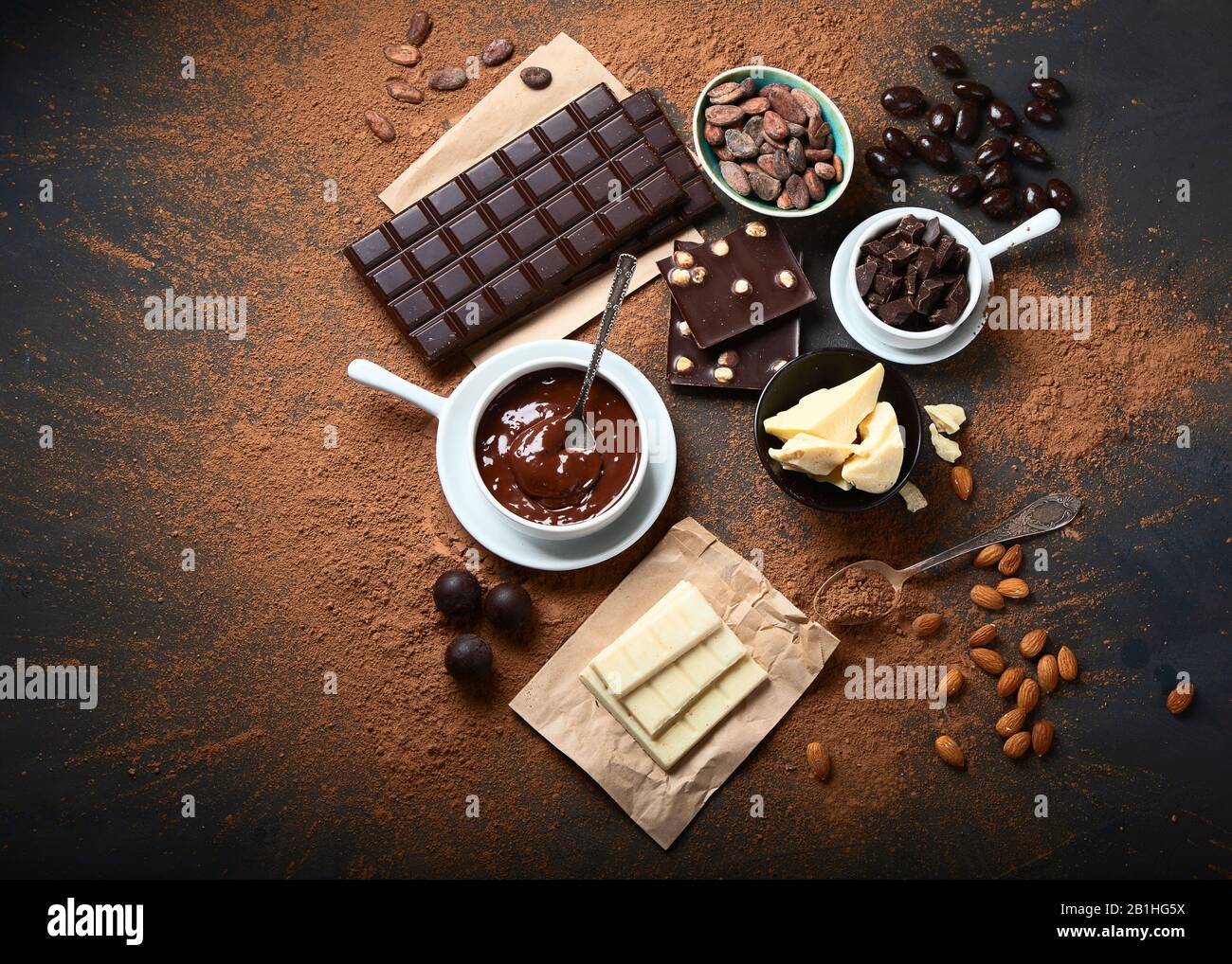 Dark chocolate bar,chocolate pieces and cocoa beans, cocoa powder on ...