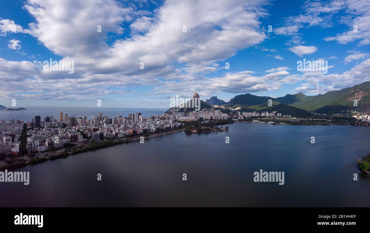 Aerial panorama of the city lake with  Two Brothers mountain including reflection in the water in the background Stock Photo