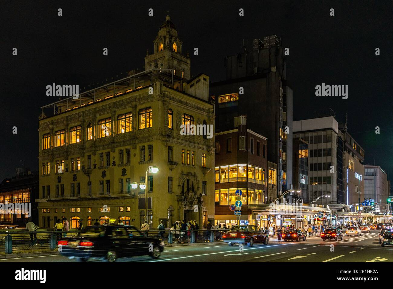 Kyoto, Japan, August 16, 2019 – Kyoto night cityscape at rush hour with Toka Saikan Chinese restaurant housed in a baroque style building Stock Photo
