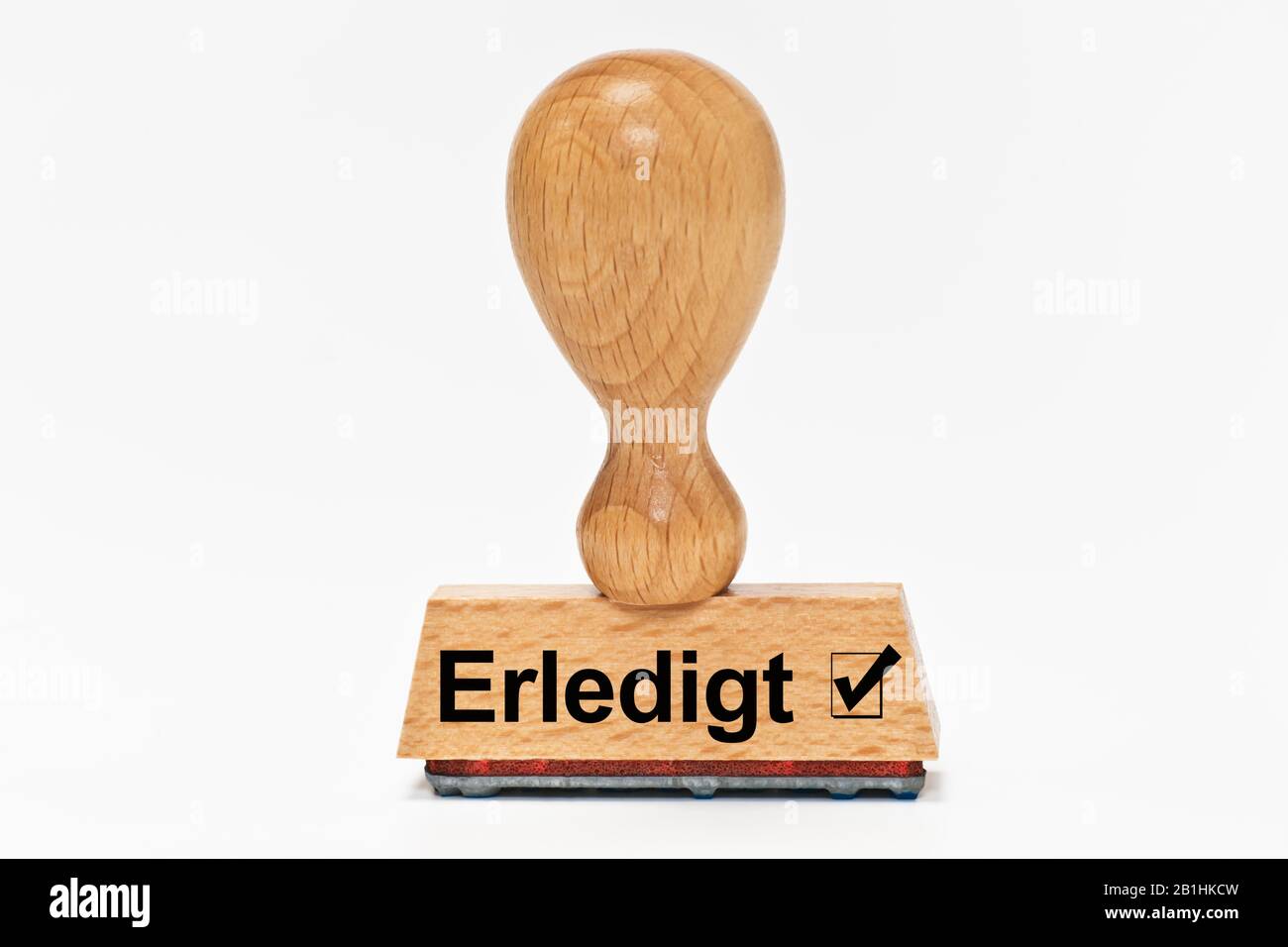 a stamp with the inscription Erledigt (finished) Stock Photo