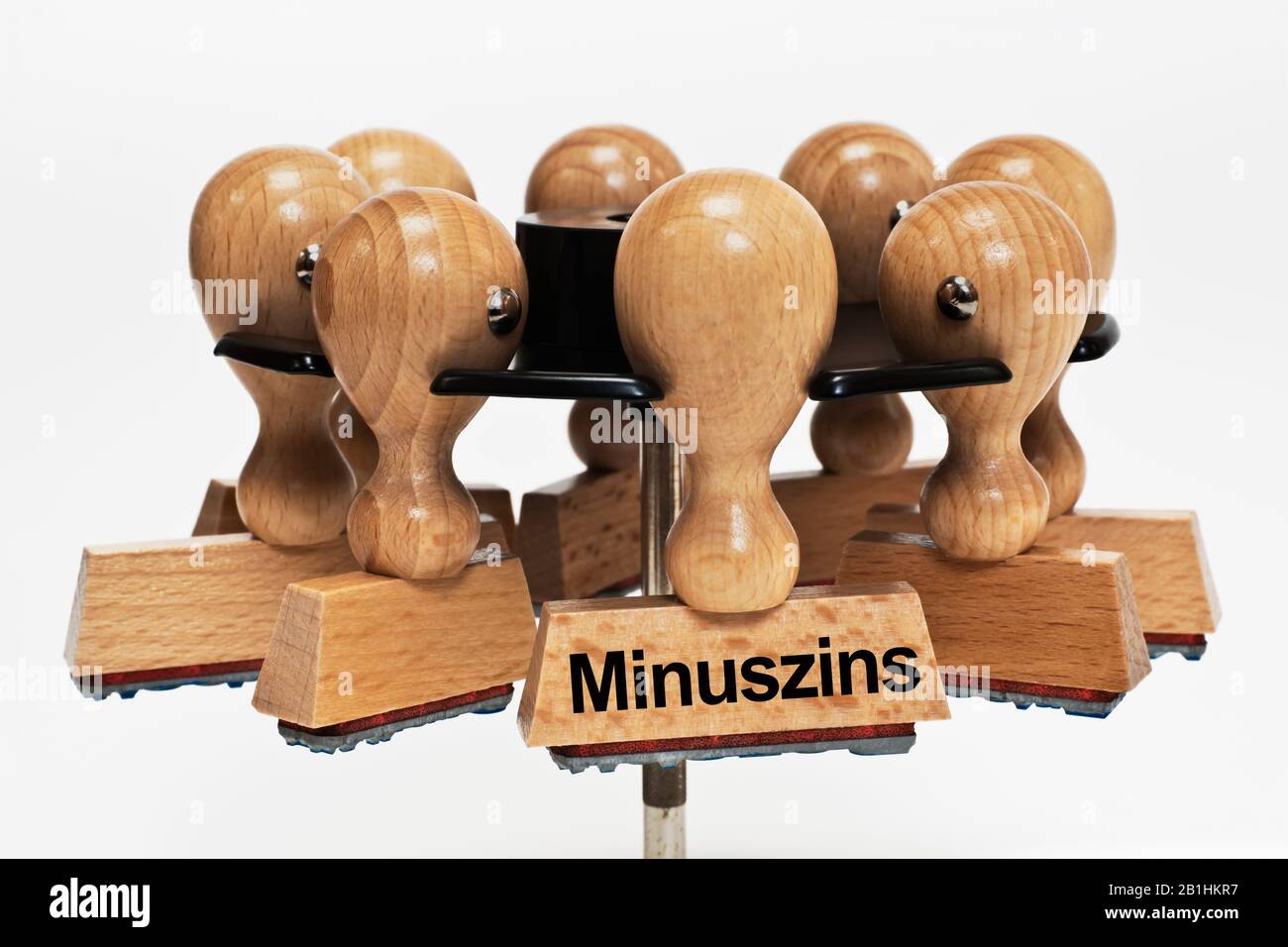 a stamp with the inscription Minuszins (negative interest rate) hangs in a stamp rack Stock Photo
