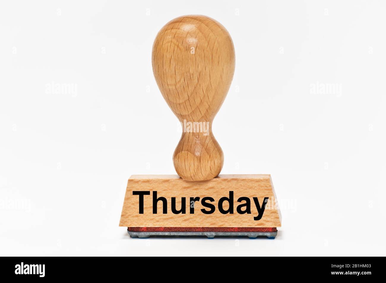 a stamp with the inscription Thursday Stock Photo