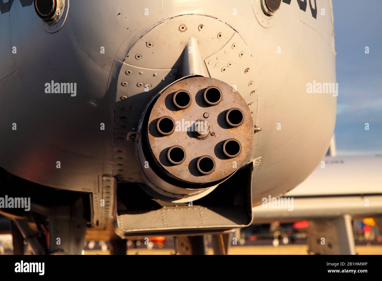 Up close photo of a 7-barrel machine gun mounted on a plane Stock Photo